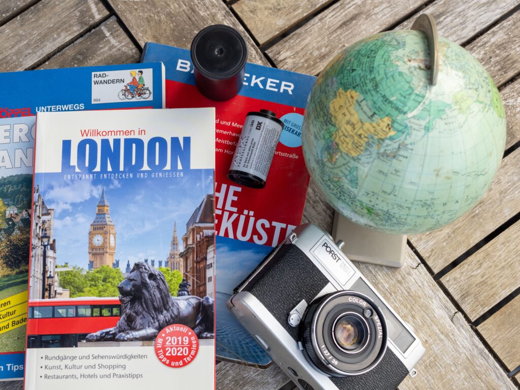 a photo of book,camera, guide